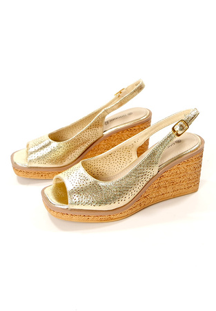 Damskie złote sandały na wyższym koturnie