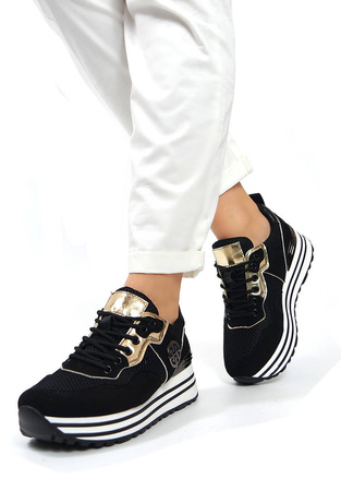 Damskie czarne obuwie sportowe koturn Potocki